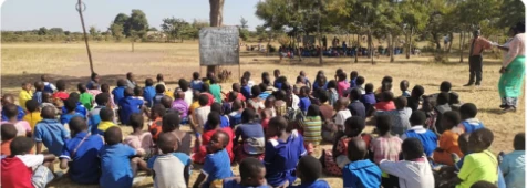 2nd Grade student in Chilima meet in an outdoor classroom